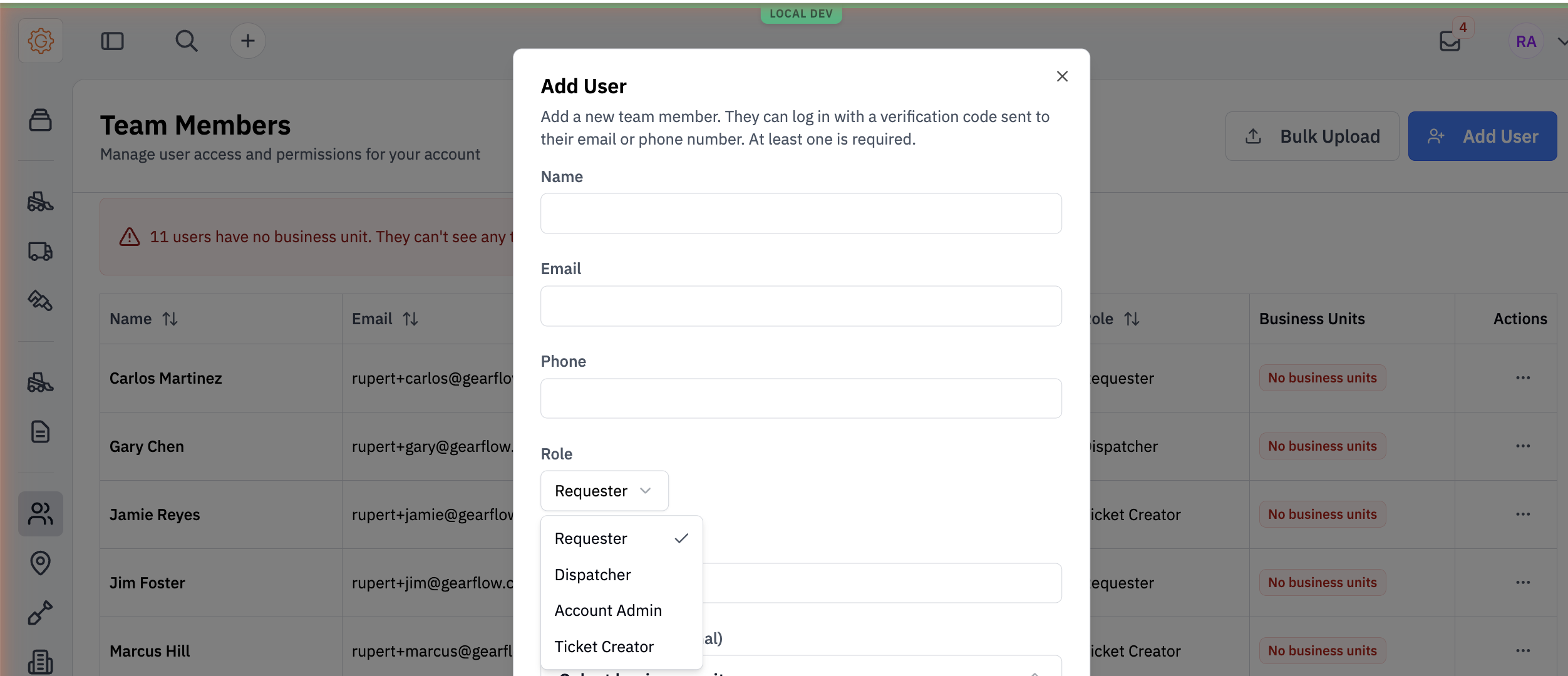 Add User dialog with the Role dropdown open showing four options including Ticket Creator